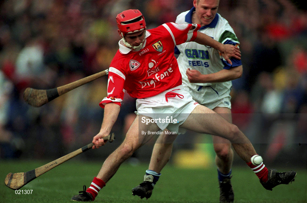 27 March 1999; Sean McGrath of Cork in action against Brian Flannery of Waterford during the Church and General National Hurling League Division 1B match between Cork and Waterford at Páirc Uí Rinn in Cork. Photo by Brendan Moran/Sportsfile