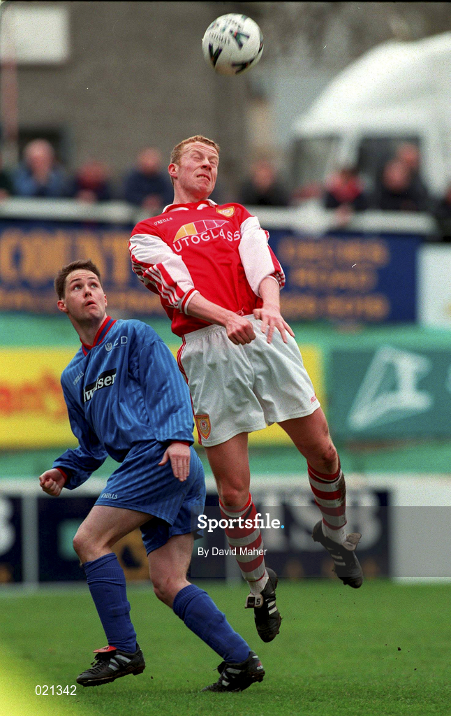 21 March 1999; Stephen McGuinness of St Patrick's Athletic in action against Mick Byrne of UCD during the Harp Lager National League Premier Division match between St Patrick's Athletic and UCD at Richmond Park in Dublin. Photo by David Maher/Sportsfile