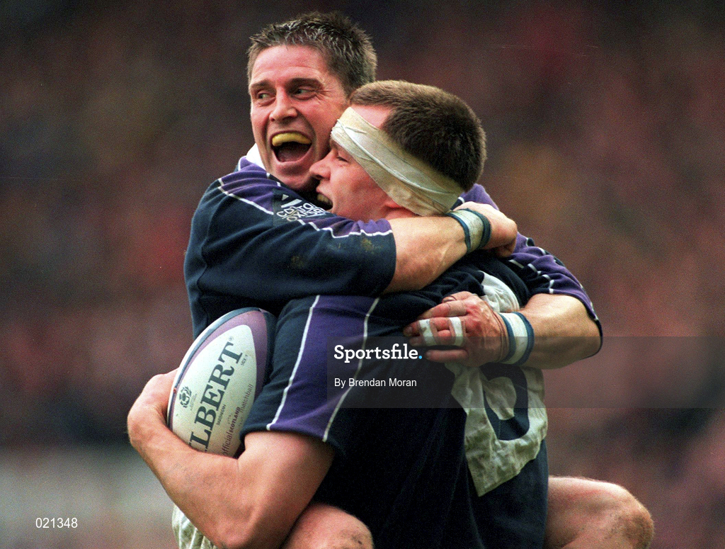 20 March 1999; Stuart Grimes of Scotland celebrates with team-mate Alan Tate, left, after scoring a try during the Five Nations Rugby Championship match between Scotland and Ireland in Murrayfield Stadium in Edinburgh, Scotland. Photo by Brendan Moran/Sportsfile