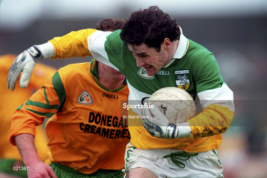 14 March 1999; Vinny Claffey  of Offaly in action against Ray Sweeney of Donegal during the Church and General National Football League Division 1 match between Offaly and Donegal at O'Connor Park in Tullamore, Offaly. Photo by Matt Browne/Sportsfile