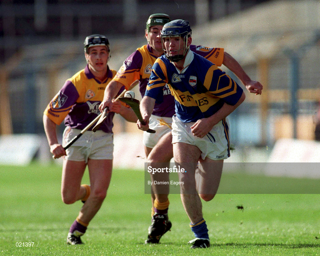 21 March 1999; William Maher of Tipperary in action against Rory cCarthy, left, and Declan Ruth of Wexford during the Church and General National Hurling League Division 1B match between Tipperary and Wexford at Semple Stadium in Thurles, Tipperary. Photo by Damien Eagers/Sportsfile