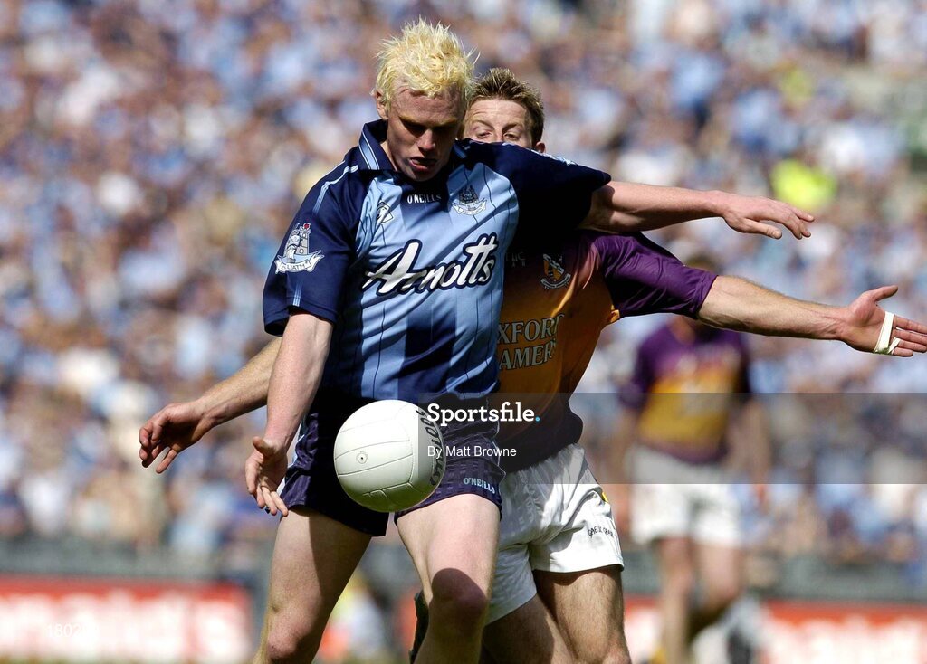 19 June 2005; Mark Vaughan, Dublin, is tackled by Niall Murphy, Wexford. Bank of Ireland Leinster Senior Football Championship Semi-Final, Dublin v Wexford, Croke Park, Dublin. Picture credit; Matt Browne / SPORTSFILE