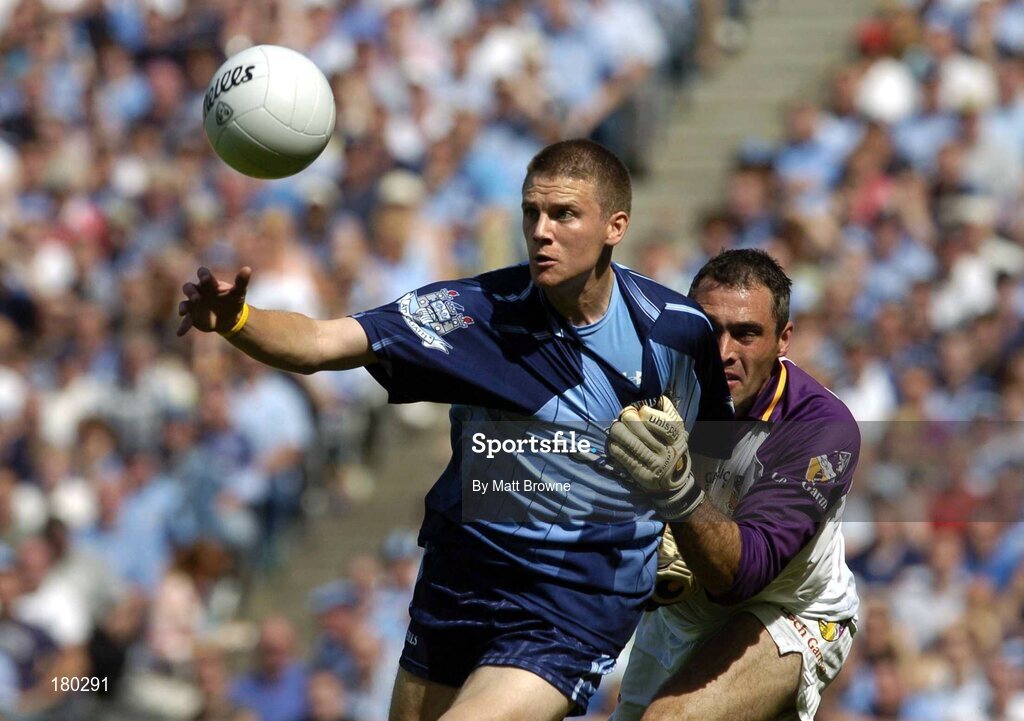19 June 2005; Tomas Quinn, Dublin, is tackled by John Cooper, Wexford. Bank of Ireland Leinster Senior Football Championship Semi-Final, Dublin v Wexford, Croke Park, Dublin. Picture credit; Matt Browne / SPORTSFILE