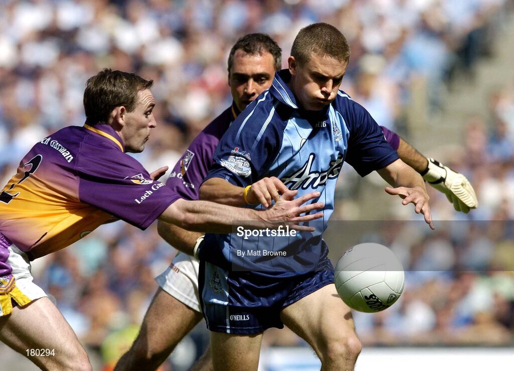 19 June 2005; Tomas Quinn, Dublin, is tackled by Colm Morris, Wexford. Bank of Ireland Leinster Senior Football Championship Semi-Final, Dublin v Wexford, Croke Park, Dublin. Picture credit; Matt Browne / SPORTSFILE