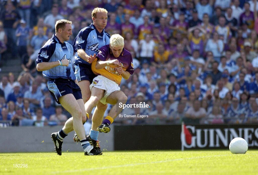 19 June 2005; Redmond Barry, Wexford, scores a goal despite the efforts of Shane Ryan and Coman Goggins, left, Dublin. Bank of Ireland Leinster Senior Football Championship Semi-Final, Dublin v Wexford, Croke Park, Dublin. Picture credit; Damien Eagers / SPORTSFILE