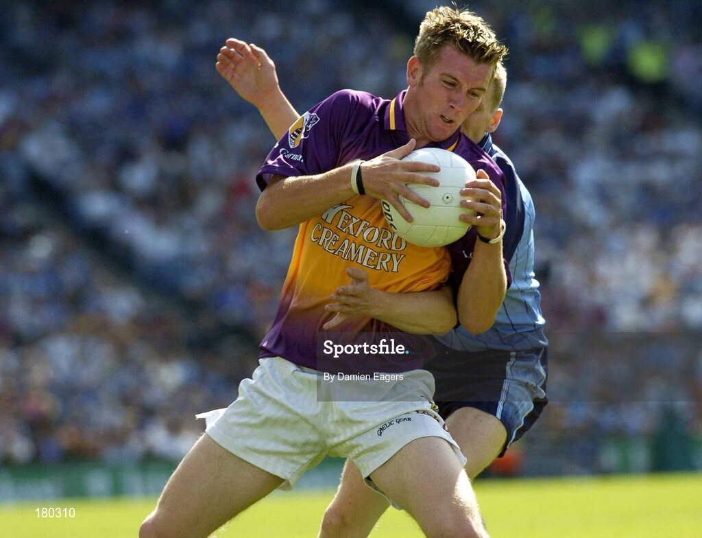 19 June 2005; P.J Banville, Wexford, in action against Stephen O'Shaughnessy, Dublin. Bank of Ireland Leinster Senior Football Championship Semi-Final, Dublin v Wexford, Croke Park, Dublin. Picture credit; Damien Eagers / SPORTSFILE