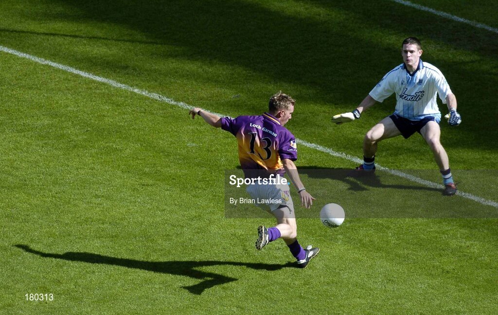19 June 2005; Wexford's P.J. Banville shoots past Dublin goalkeeper Stephen Cluxton for his sides second goal. Bank of Ireland Leinster Senior Football Championship Semi-Final, Dublin v Wexford, Croke Park, Dublin. Picture credit; Brian Lawless / SPORTSFILE