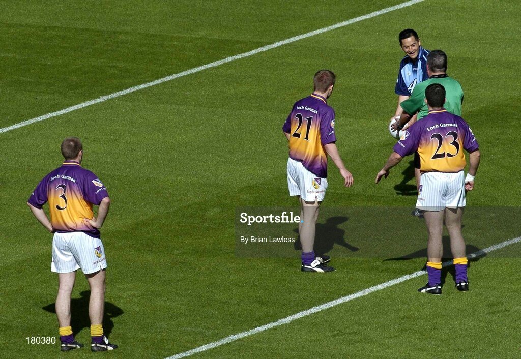 19 June 2005; Referee Brian Crowe takes the ball from Dublin's Jason Sherlock at the end of the match as Wexford players, from left, Philip Wallace, Darren Foran, and Jim D'Arcy look on. Bank of Ireland Leinster Senior Football Championship Semi-Final, Dublin v Wexford, Croke Park, Dublin. Picture credit; Brian Lawless / SPORTSFILE