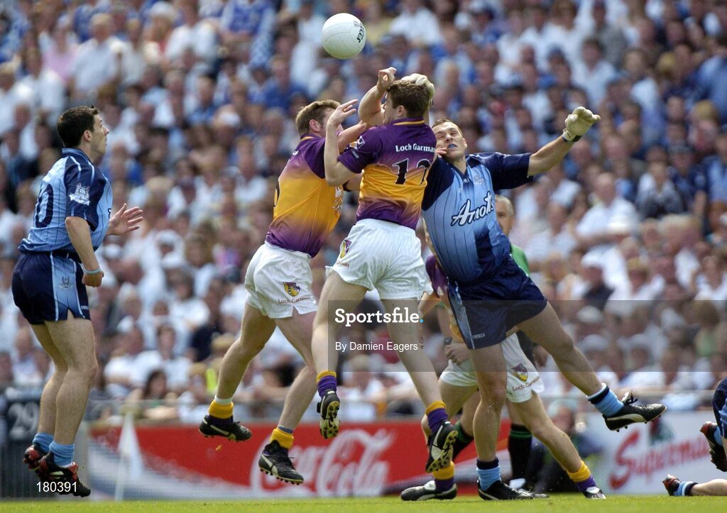19 June 2005; Ciaran Whelan, right, and Colin Moran, Dublin, in action against Shane Cullen, (12) and Nicky Lambert, Wexford. Bank of Ireland Leinster Senior Football Championship Semi-Final, Dublin v Wexford, Croke Park, Dublin. Picture credit; Damien Eagers / SPORTSFILE