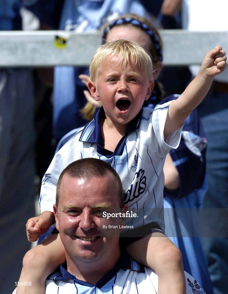 19 June 2005; Young Dublin fan Allan Donnelly, age 4, cheers on his side with his dad Darragh. Bank of Ireland Leinster Senior Football Championship Semi-Final, Dublin v Wexford, Croke Park, Dublin. Picture credit; Brian Lawless / SPORTSFILE