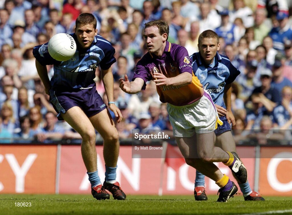 19 June 2005; Colm Morris, Wexford, in action against Conal Keaney, left, and Tomas Quinn, Dublin. Bank of Ireland Leinster Senior Football Championship Semi-Final, Dublin v Wexford, Croke Park, Dublin. Picture credit; Matt Browne / SPORTSFILE