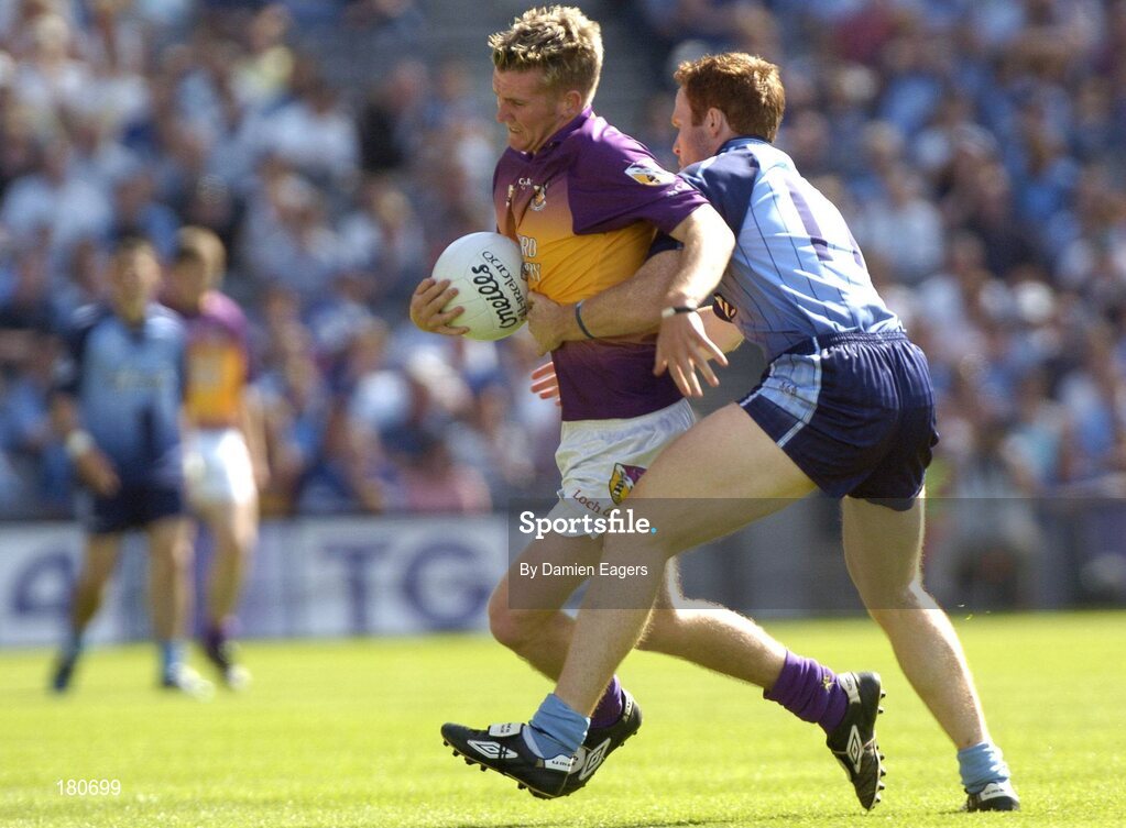 19 June 2005; P.J Banville, Wexford, in action against Peader Andrews, Dublin. Bank of Ireland Leinster Senior Football Championship Semi-Final, Dublin v Wexford, Croke Park, Dublin. Picture credit; Damien Eagers / SPORTSFILE