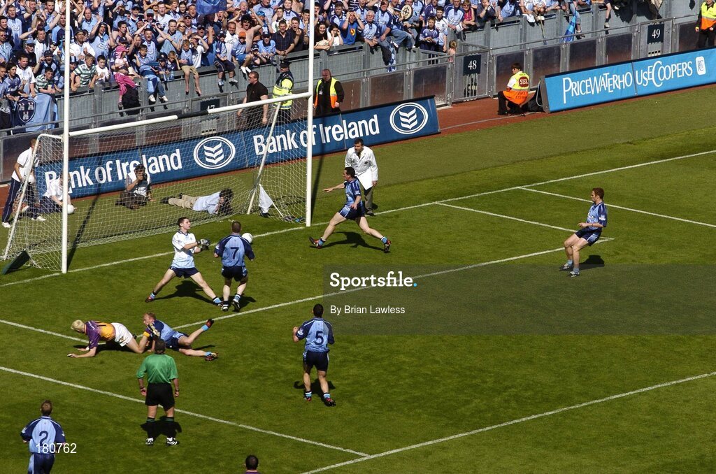 19 June 2005; Wexford's Redmond Barry watches his rebound shot cross the line as Dublin players, from left, Paul Griffin (2), Shane Ryan, Stephen Cluxton, goalkeeper, Coman Goggins (7), Paul Casey (5), Paddy Christie, and Peadar Andrews look on. Bank of Ireland Leinster Senior Football Championship Semi-Final, Dublin v Wexford, Croke Park, Dublin. Picture credit; Brian Lawless / SPORTSFILE