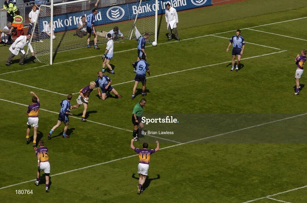 19 June 2005; Wexford players celebrate after Redmond Barry, fourth from left, had scored their first goal from a rebounded penalty as Dublin players look on. Bank of Ireland Leinster Senior Football Championship Semi-Final, Dublin v Wexford, Croke Park, Dublin. Picture credit; Brian Lawless / SPORTSFILE