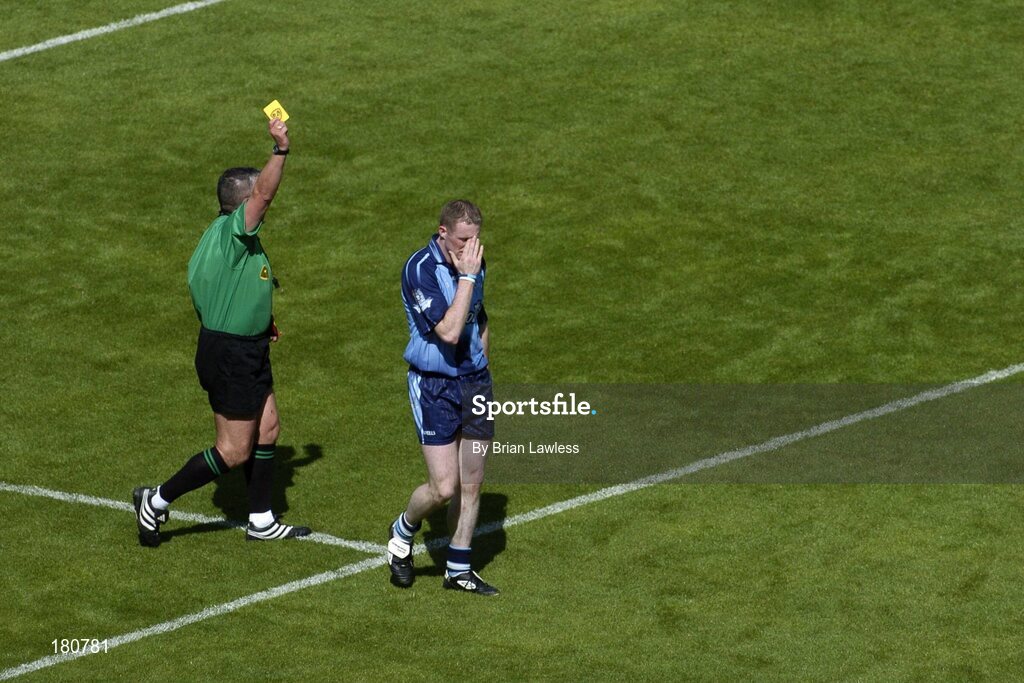 19 June 2005; Dublin's Coman Goggins is shown the yellow card by referee Brian Crowe. Bank of Ireland Leinster Senior Football Championship Semi-Final, Dublin v Wexford, Croke Park, Dublin. Picture credit; Brian Lawless / SPORTSFILE