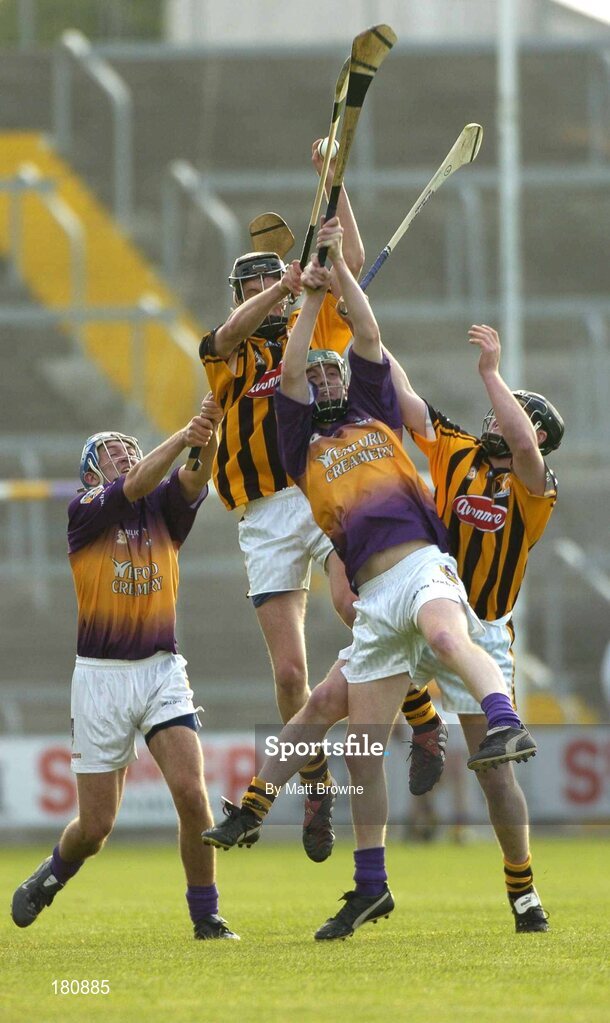22 June 2005; Michael Fennelly, Kilkenny, wins possession from his team-mate Stephen Maher and Wexford players Colin Breen, left, and Richie Kehoe. U21 Leinster Hurling Championship Semi-Final, Wexford v Kilkenny, Wexford Park, Wexford. Picture credit; Matt Browne / SPORTSFILE