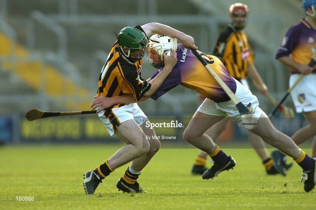 22 June 2005; Eoin Larkin, Kilkenny, is tackled by Cieran Kenny, Wexford. U21 Leinster Hurling Championship Semi-Final, Wexford v Kilkenny, Wexford Park, Wexford. Picture credit; Matt Browne / SPORTSFILE