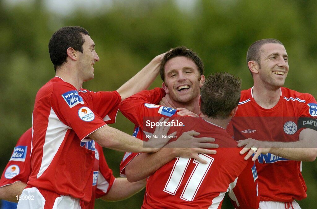 24 June 2005; Stuart Byrne, Shelbourne, is congratulated by team-mates Richie Baker,11, Jason Byrne, left, and  Owen Heary, after scoring Shelbournes second goal against Waterford United. eircom League, Premier Division, Waterford United v Shelbourne, Waterford RSC, Waterford. Picture credit; Matt Browne / SPORTSFILE