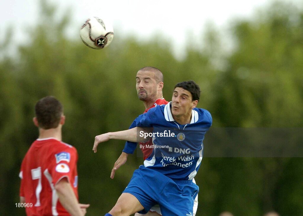 24 June 2005; Dave Rogers, Shelbourne, in action against Vinnie Sullivan, Waterford United. eircom League, Premier Division, Waterford United v Shelbourne, Waterford RSC, Waterford. Picture credit; Matt Browne / SPORTSFILE
