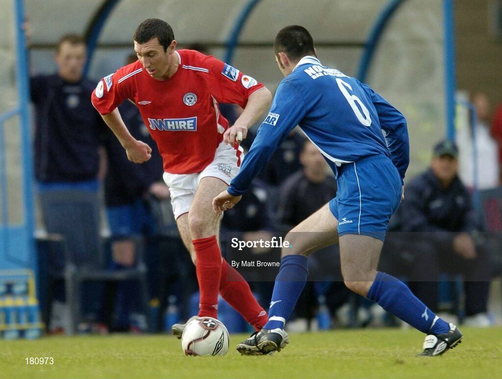 24 June 2005; Jason Byrne, Shelbourne, in action against Neil Andrews, Waterford United. eircom League, Premier Division, Waterford United v Shelbourne, Waterford RSC, Waterford. Picture credit; Matt Browne / SPORTSFILE