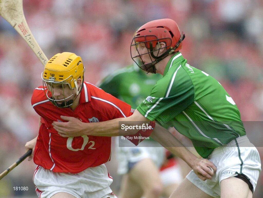 26 June 2005; Cathal Naughton, Cork, in action against, Liam Hurley, Limerick. Munster Minor Hurling Championship Final, Cork v Limerick, Pairc Ui Chaoimh, Cork. Picture Credit; Ray McManus / SPORTSFILE