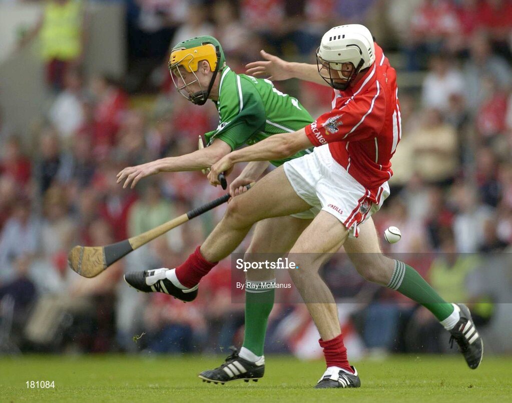 26 June 2005; Peter O'Brien, Cork, in action against Don Hanley, Limerick. Munster Minor Hurling Championship Final, Cork v Limerick, Pairc Ui Chaoimh, Cork. Picture Credit; Ray McManus / SPORTSFILE
