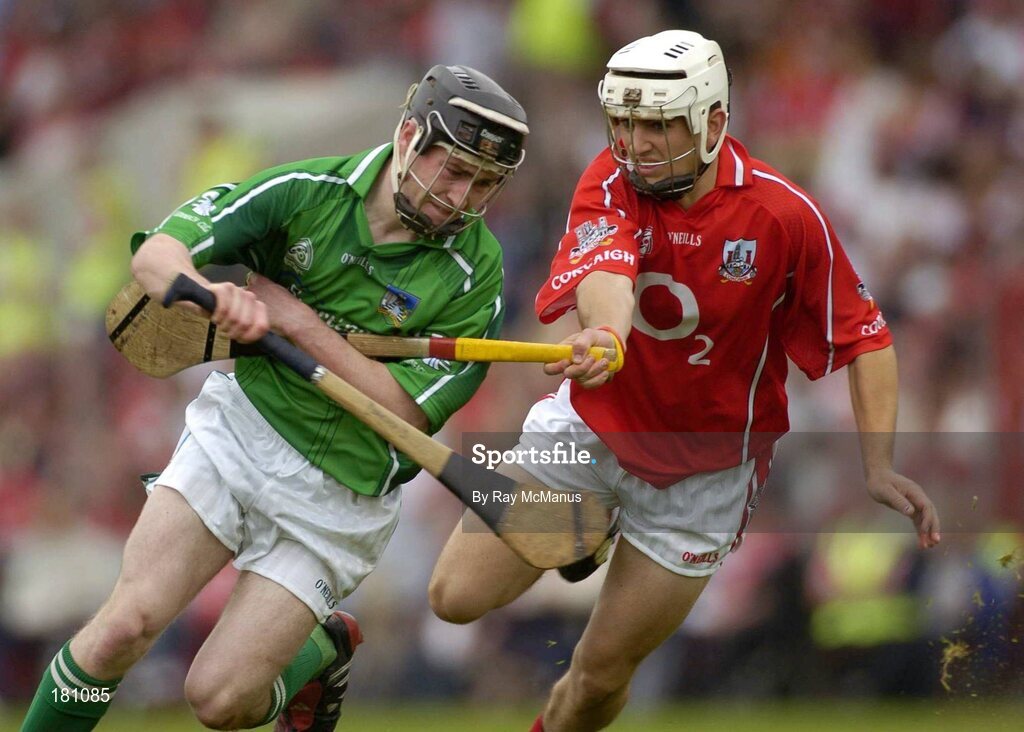26 June 2005; Diarmuid O'Sullivan, Limerick, in action against Ger O'Driscoll, Cork. Munster Minor Hurling Championship Final, Cork v Limerick, Pairc Ui Chaoimh, Cork. Picture Credit; Ray McManus / SPORTSFILE