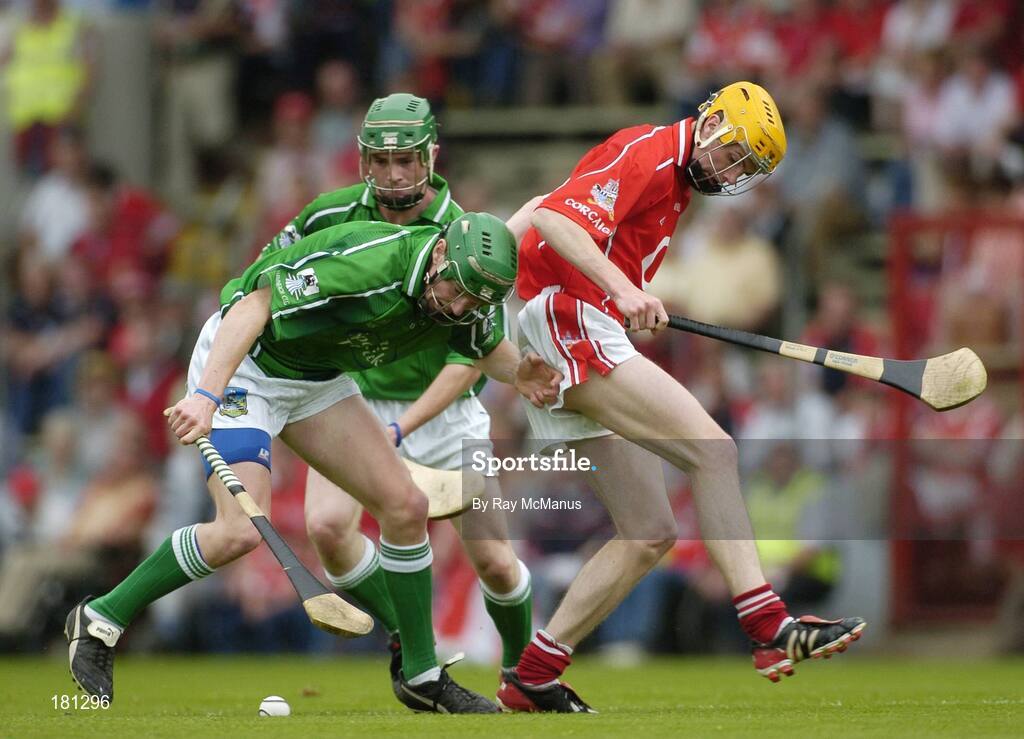 26 June 2005; Seamus Hickey, Limerick, in action against Cathal Naughton, Cork. Munster Minor Hurling Championship Final, Cork v Limerick, Pairc Ui Chaoimh, Cork. Picture Credit; Ray McManus / SPORTSFILE