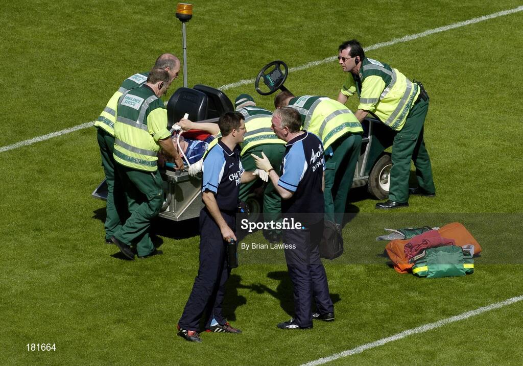 19 June 2005; John Murphy, left, Chartered Physiotherapist, Dublin, and Professor Gerry McElvaney, Dublin team doctor, in conversation as Dublin's Stephen O'Shaughnessy is stretchered off. Bank of Ireland Leinster Senior Football Championship Semi-Final, Dublin v Wexford, Croke Park, Dublin. Picture credit; Brian Lawless / SPORTSFILE