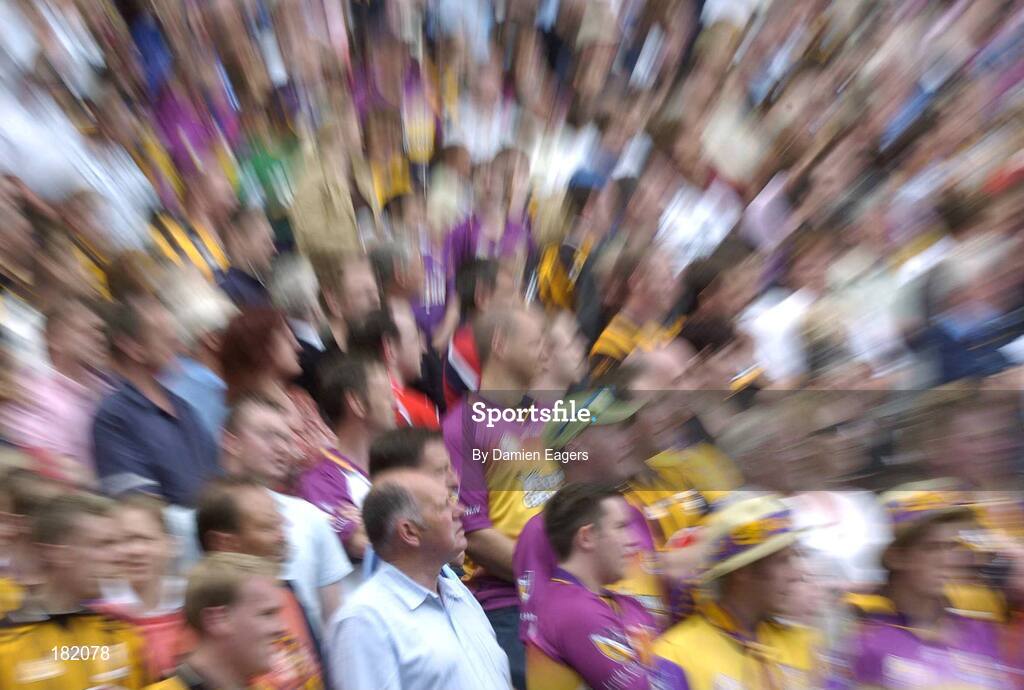 3 July 2005; The Wexford supporters stand for the national anthem. Guinness Leinster Senior Hurling Championship Final, Kilkenny v Wexford, Croke Park, Dublin. Picture credit; Damien Eagers / SPORTSFILE