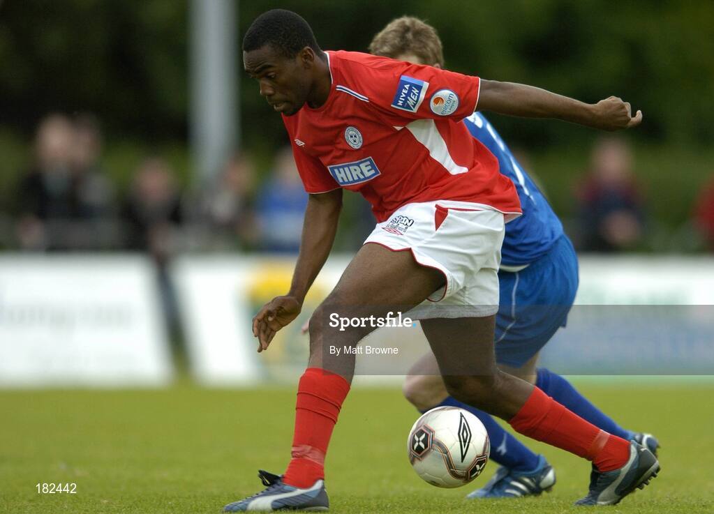 24 June 2005; Joseph Ndo, Shelbourne, in action against Steve Yelverton, Waterford United. eircom League, Premier Division, Waterford United v Shelbourne, Waterford RSC, Waterford. Picture credit; Matt Browne / SPORTSFILE