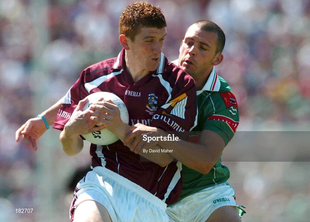 10 July 2005; Kieran Fitzgerald, Galway, is tackled by Trevor Mortimer, Mayo. Bank of Ireland Connacht Senior Football Championship Final, Galway v Mayo, Pearse Stadium, Galway. Picture credit; David Maher / SPORTSFILE