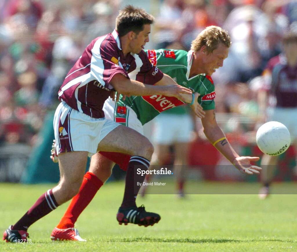 10 July 2005; Ciaran McDonald, Mayo, is tackled by Matthew Clancy, Galway. Bank of Ireland Connacht Senior Football Championship Final, Galway v Mayo, Pearse Stadium, Galway. Picture credit; David Maher / SPORTSFILE
