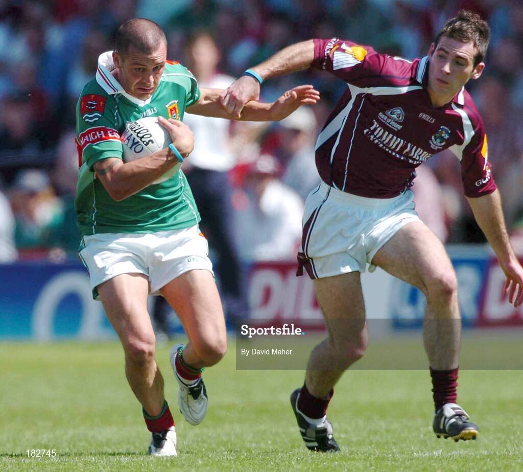 10 July 2005; Trevor Mortimer, Mayo, is tackled by Damien Burke, Galway. Bank of Ireland Connacht Senior Football Championship Final, Galway v Mayo, Pearse Stadium, Galway. Picture credit; David Maher / SPORTSFILE