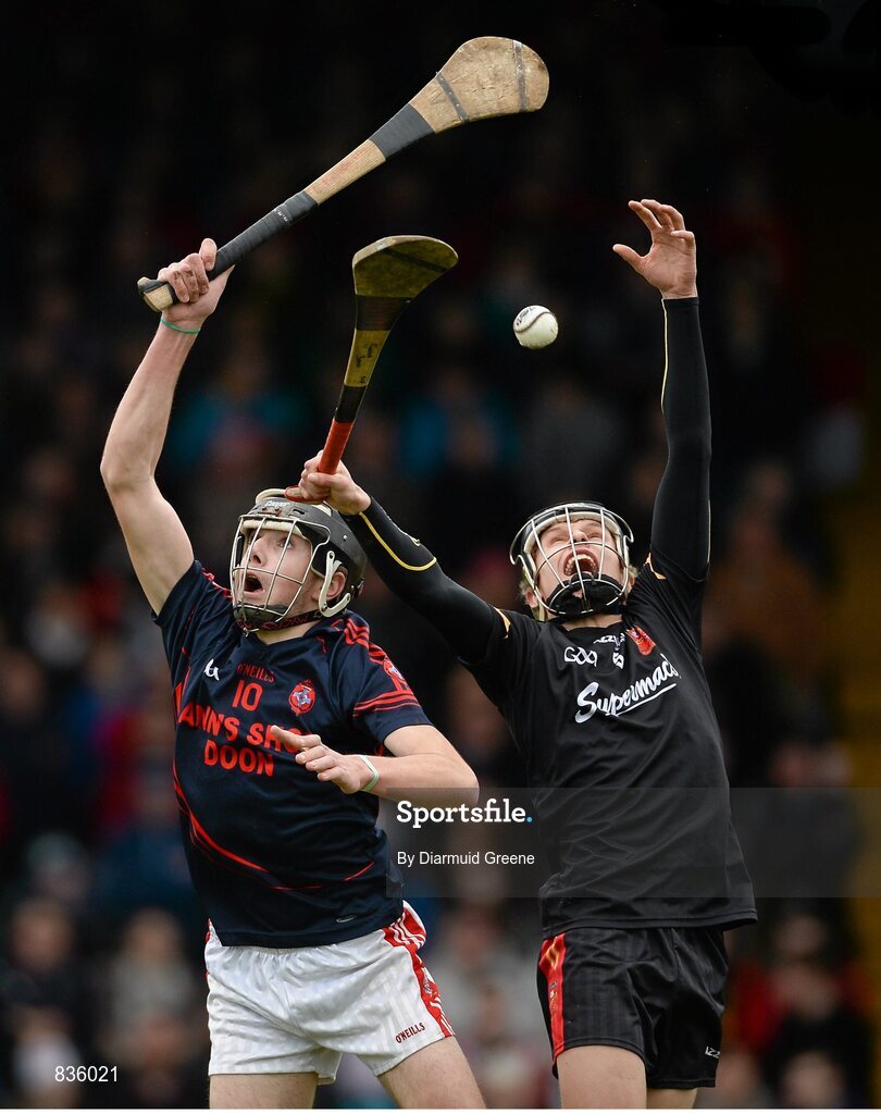 22 February 2014; Colin Ryan, Scoil na Trionoide Naofa, in action against Gordon Browne, Ard Scoil Ris. Dr. Harty Cup Final, Scoil na Trionoide Naofa, Doon v Ard Scoil Ris, Limerick. Gaelic Grounds, Limerick. Picture credit: Diarmuid Greene / SPORTSFILE