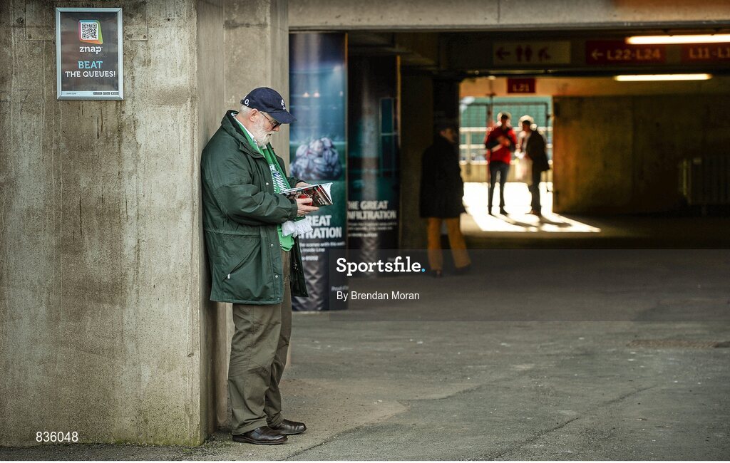 22 February 2014; An Ireland supporter reads his match programme ahead of the game. RBS Six Nations Rugby Championship, England v Ireland. Twickenham Stadium, Twickenham, London, England. Picture credit: Brendan Moran / SPORTSFILE
