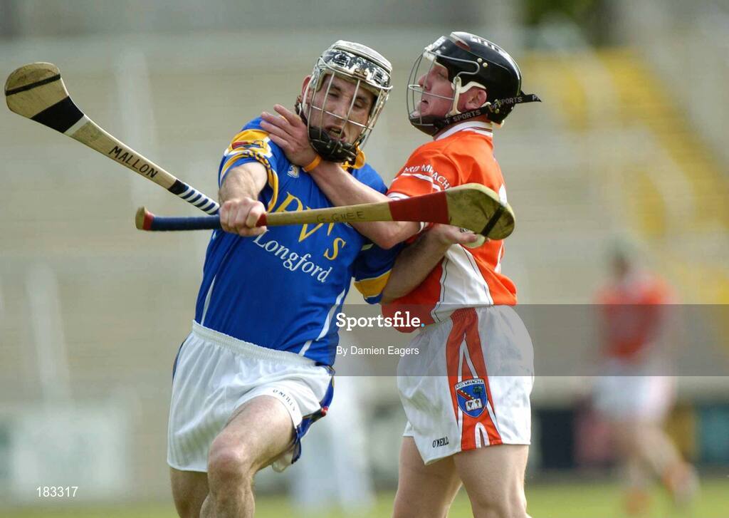 16 July 2005; Gareth Ghee, Longford, is tackled by Brian Mallon, Armagh. Nicky Rackard Cup, Group C Quarter-Final Play Off, Longford v Armagh, Kingspan Breffni Park, Cavan. Picture credit; Damien Eagers / SPORTSFILE