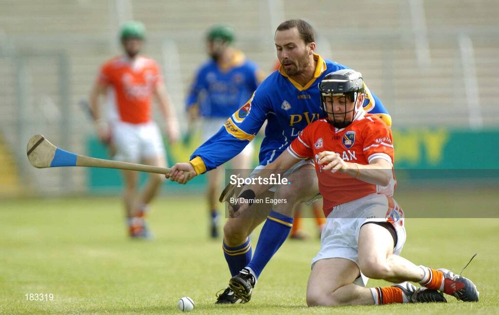 16 July 2005; Eddie Ferran, Armagh, is tackled by Sean Browne, Longford. Nicky Rackard Cup, Group C Quarter-Final Play Off, Longford v Armagh, Kingspan Breffni Park, Cavan. Picture credit; Damien Eagers / SPORTSFILE