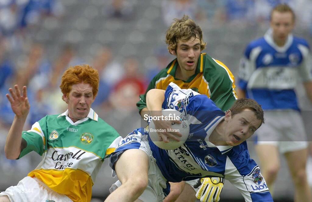 17 July 2005; Ciaran Delaney, Laois, is tackled by Diarmuid Horan, left, and Dean Bracken, Offaly, which resulted in a penalty for Laois. Leinster Minor Football Championship Final, Offaly v Laois, Croke Park, Dublin. Picture credit; Brendan Moran / SPORTSFILE