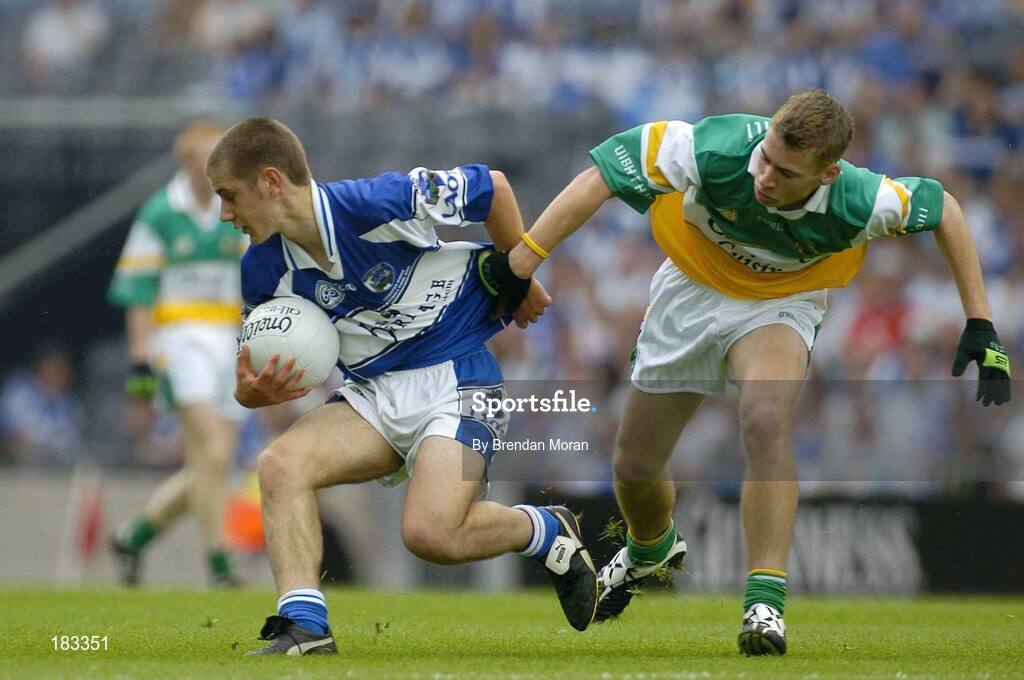 17 July 2005; Sean O'Shea, Laois, is tackled by Keith Higgins, Offaly. Leinster Minor Football Championship Final, Offaly v Laois, Croke Park, Dublin. Picture credit; Brendan Moran / SPORTSFILE