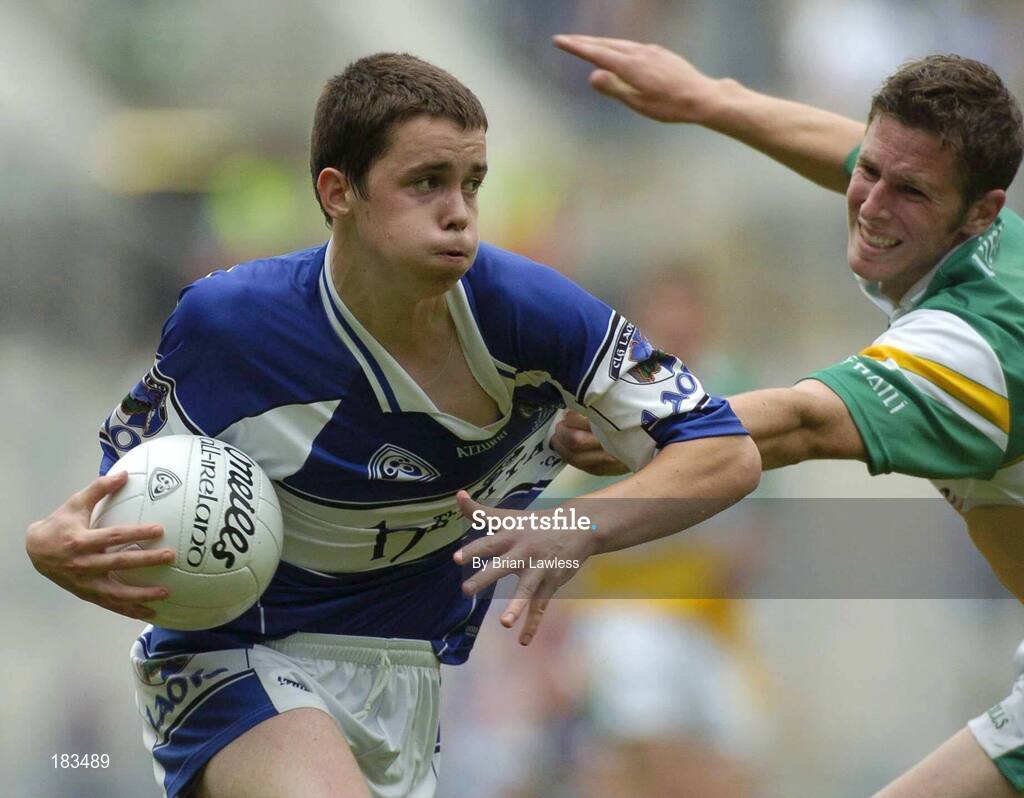 17 July 2005; Ciaran Delaney, Laois, is tackled by David Larkin, Offaly. Leinster Minor Football Championship Final, Offaly v Laois, Croke Park, Dublin. Picture credit; Brian Lawless / SPORTSFILE