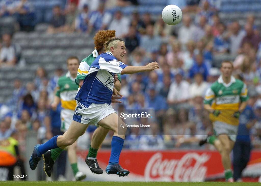 17 July 2005; Stephen O'Leary, Laois, is tackled by Diarmuid Horan, Offaly. Leinster Minor Football Championship Final, Offaly v Laois, Croke Park, Dublin. Picture credit; Brendan Moran / SPORTSFILE