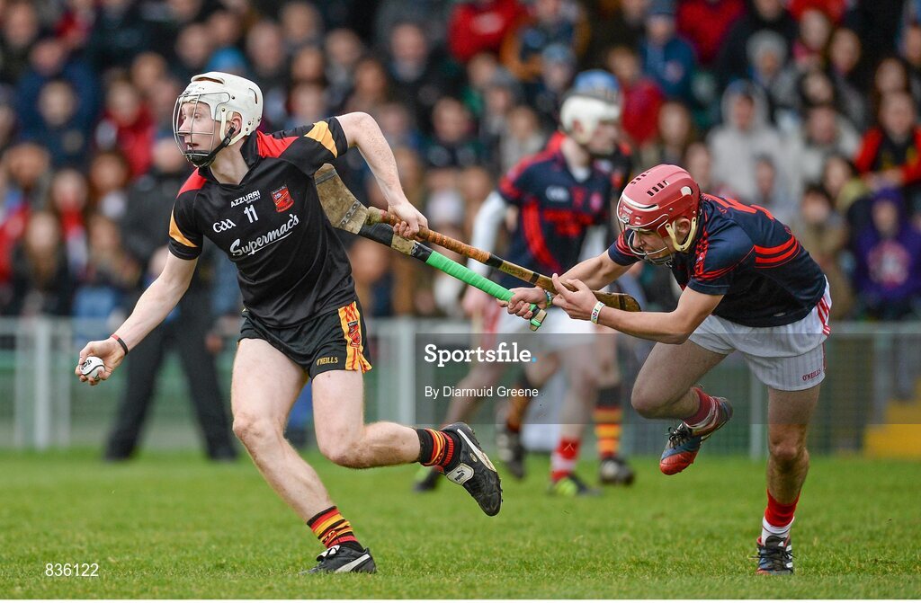 22 February 2014; Cian Lynch, Ard Scoil Ris, in action against Brian McCarthy, Scoil na Trionoide Naofa. Dr. Harty Cup Final, Scoil na Trionoide Naofa, Doon v Ard Scoil Ris, Limerick. Gaelic Grounds, Limerick. Picture credit: Diarmuid Greene / SPORTSFILE