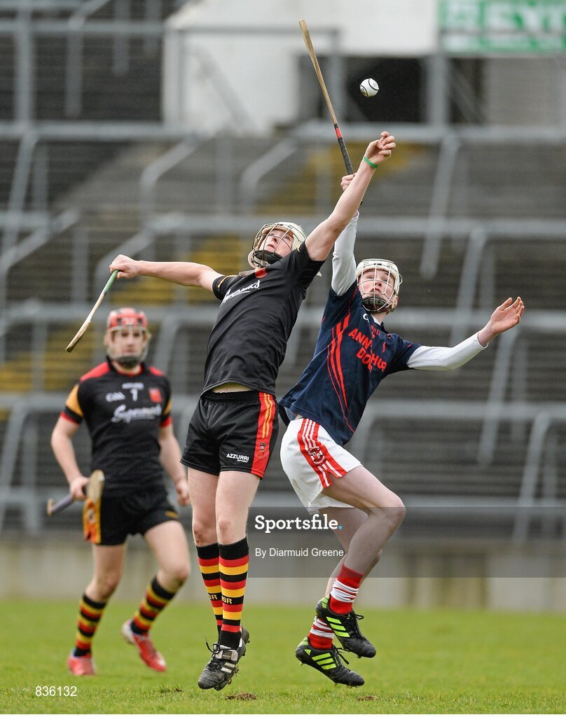 22 February 2014; Charlie McCarthy, Ard Scoil Ris, in action against Jack Cummins, Scoil na Trionoide Naofa. Dr. Harty Cup Final, Scoil na Trionoide Naofa, Doon v Ard Scoil Ris, Limerick. Gaelic Grounds, Limerick. Picture credit: Diarmuid Greene / SPORTSFILE