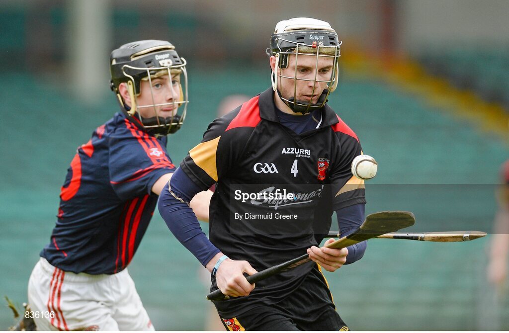 22 February 2014; Josh O'Halloran, Ard Scoil Ris, in action against Barry Murphy, Scoil na Trionoide Naofa. Dr. Harty Cup Final, Scoil na Trionoide Naofa, Doon v Ard Scoil Ris, Limerick. Gaelic Grounds, Limerick. Picture credit: Diarmuid Greene / SPORTSFILE