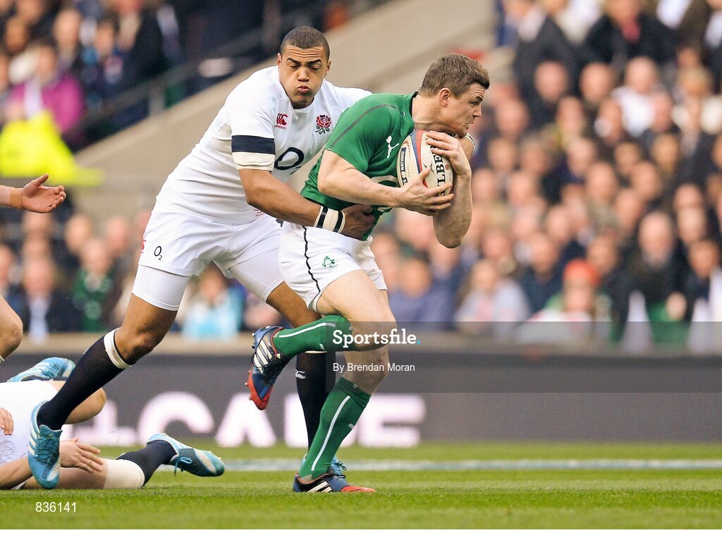 22 February 2014; Brian O'Driscoll, Ireland is tackled by Luther Burrell, England. RBS Six Nations Rugby Championship, England v Ireland. Twickenham Stadium, Twickenham, London, England. Picture credit: Brendan Moran / SPORTSFILE