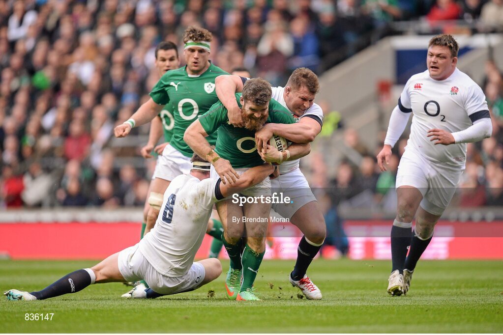 22 February 2014; Gordon D'Arcy, Ireland, is tackled by Billy Vunipola, left, and Dylan Hartley, England. RBS Six Nations Rugby Championship, England v Ireland. Twickenham Stadium, Twickenham, London, England. Picture credit: Brendan Moran / SPORTSFILE