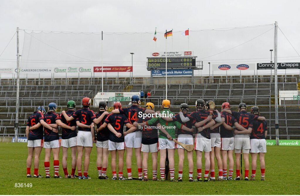 22 February 2014; The Scoil na Trionoide Naofa team stand together during the playing of the national anthem. Dr. Harty Cup Final, Scoil na Trionoide Naofa, Doon v Ard Scoil Ris, Limerick. Gaelic Grounds, Limerick. Picture credit: Diarmuid Greene / SPORTSFILE