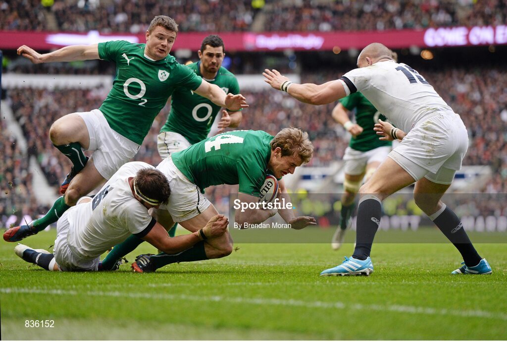 22 February 2014; Andrew Trimble, Ireland is tackled just short of the try line by Tom Wood, England. RBS Six Nations Rugby Championship, England v Ireland. Twickenham Stadium, Twickenham, London, England. Picture credit: Brendan Moran / SPORTSFILE