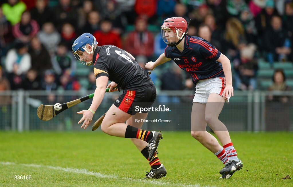 22 February 2014; Michael Casey, Ard Scoil Ris, in action against Joe Lonergan, Scoil na Trionoide Naofa. Dr. Harty Cup Final, Scoil na Trionoide Naofa, Doon v Ard Scoil Ris, Limerick. Gaelic Grounds, Limerick. Picture credit: Diarmuid Greene / SPORTSFILE